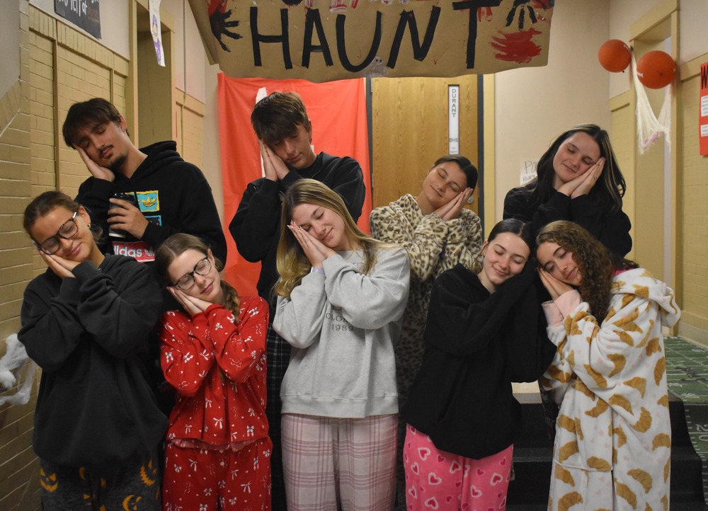 Yearbook Staff students posing for Pajama Day spirit week picture