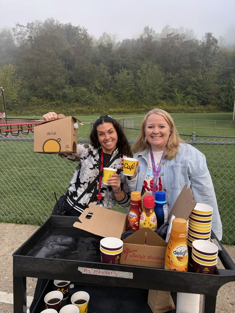 handing out coffee for Attendance month! 