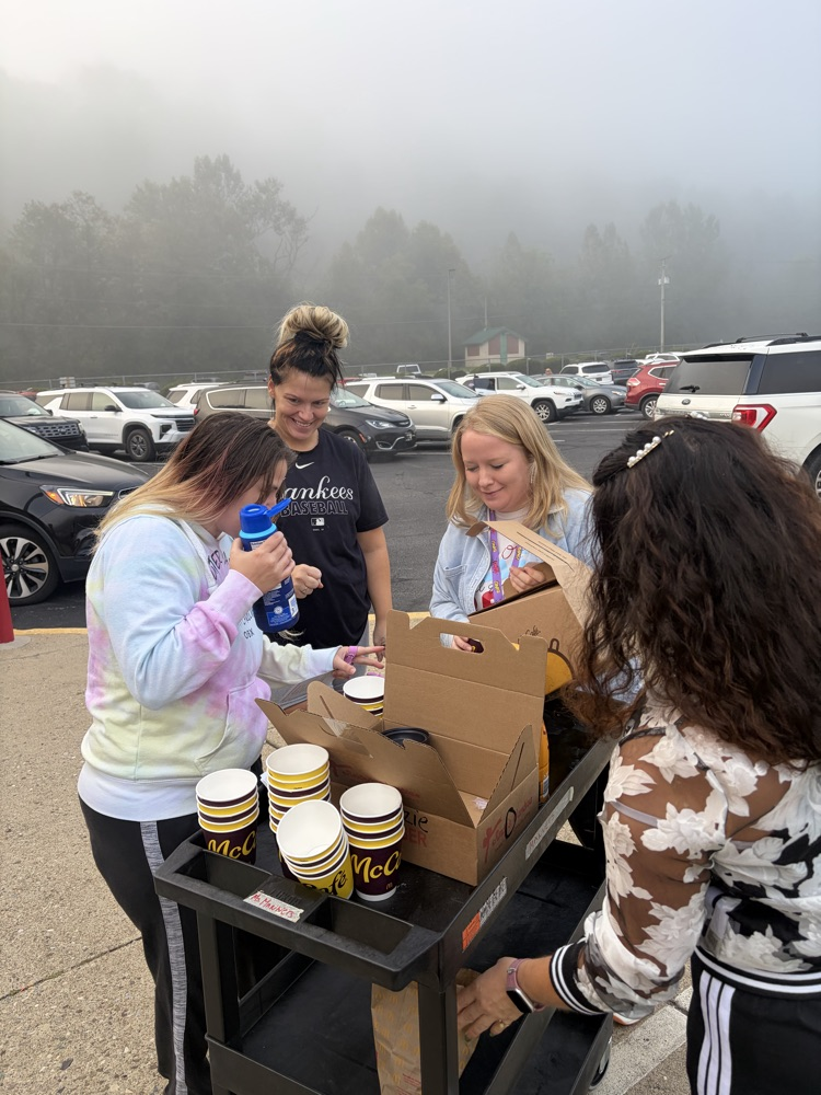 handing out coffee for Attendance month! 