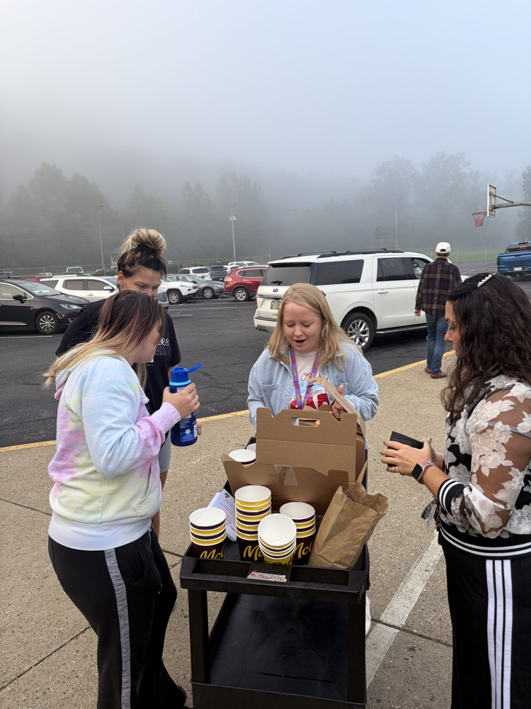 handing out coffee for Attendance month! 