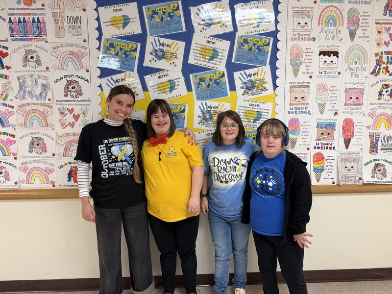 Celebrating Down Syndrome awareness month in style! Pictured from left to right: Miss Jazmyn Hunt (7th grade ParaPro), Fara Bricker (Fresheman), Emma Juelfs (Senior), and Sadee Keil (Freshman)
