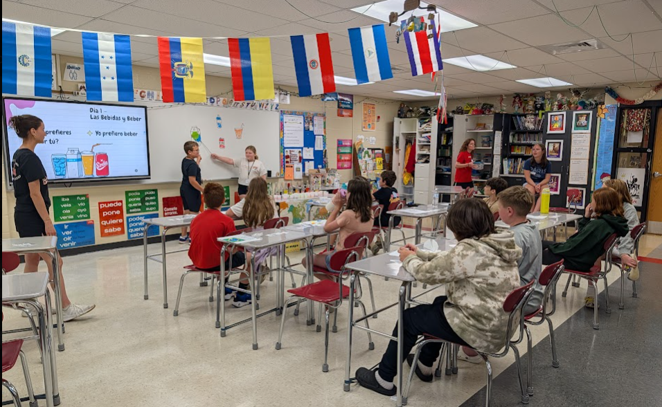 a group of students learning Spanish