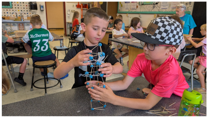 boys creating a structure