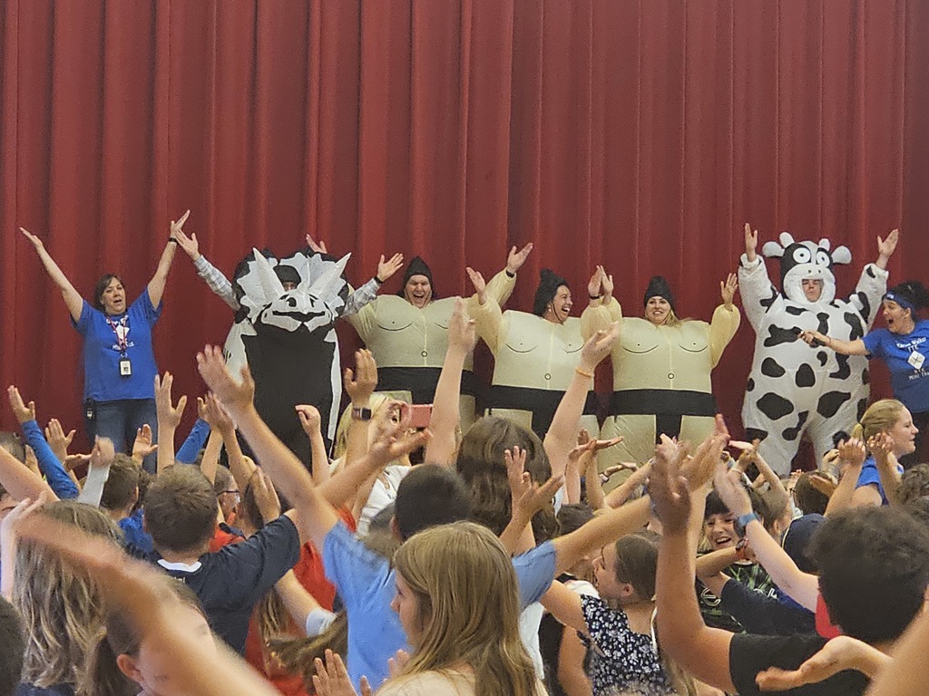 Teachers in blow up cosumes.
