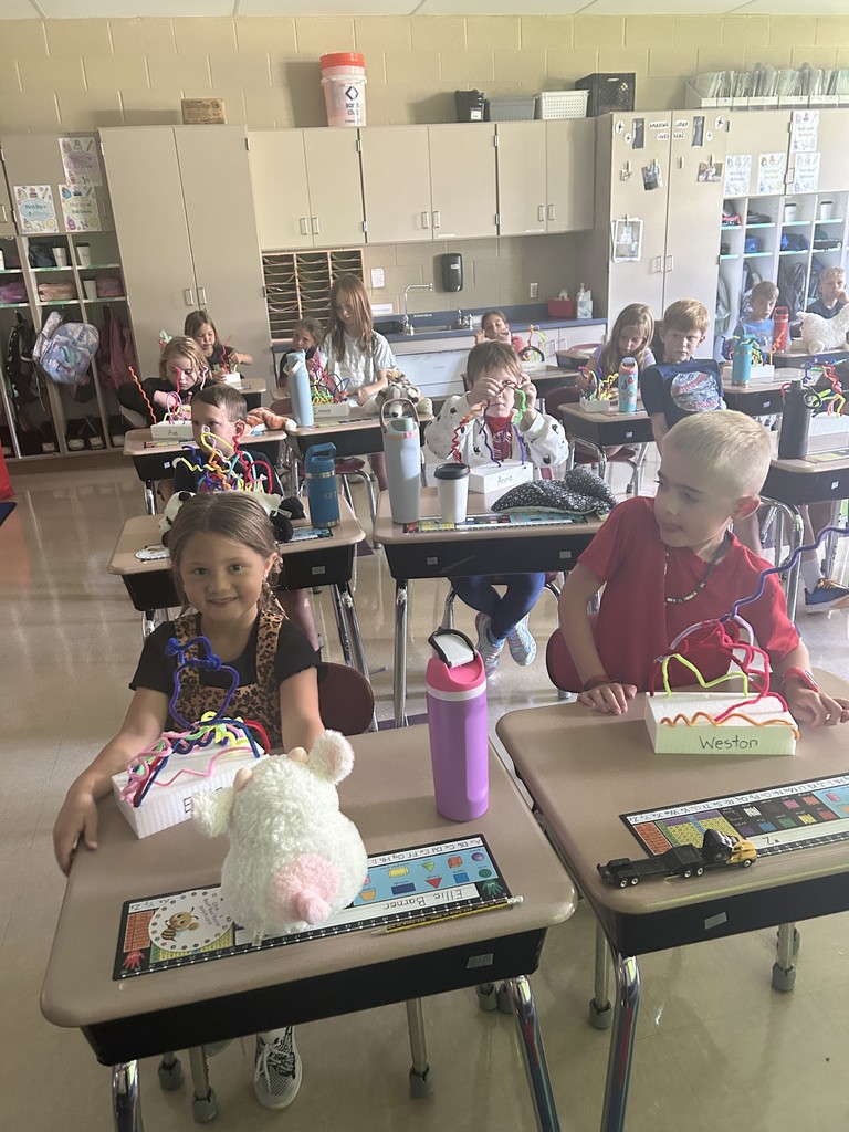 Students in a classroom completing sculptures. 2