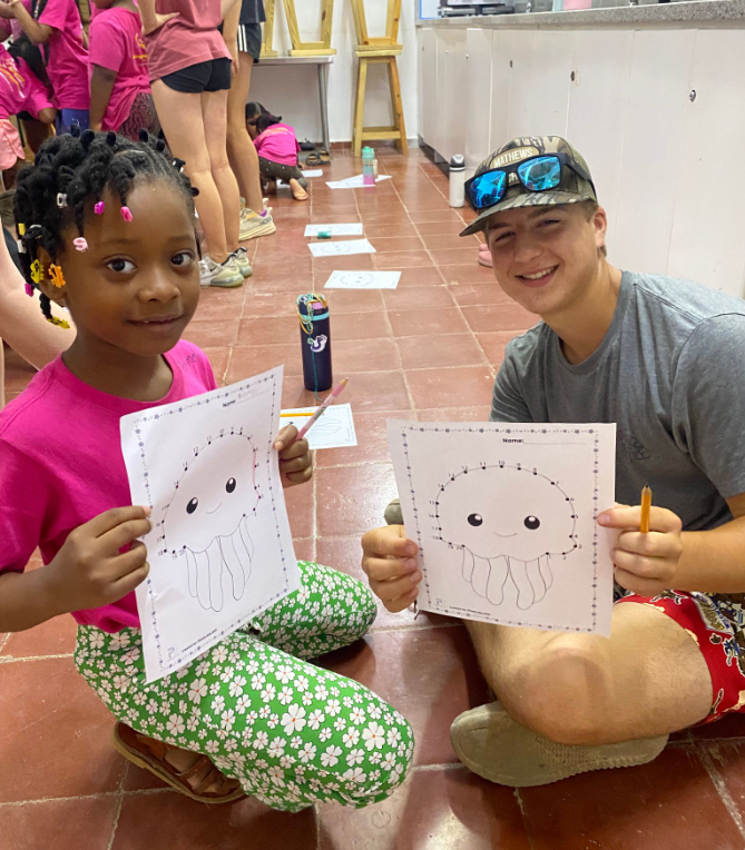 2 young people drawing