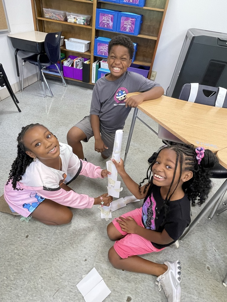 Our 3rd Grade Family read “Too Tall Houses” today and worked together to construct team towers.