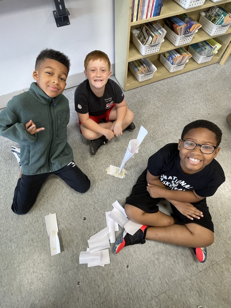 Our 3rd Grade Family read “Too Tall Houses” today and worked together to construct team towers.