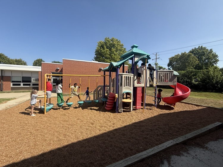 students playing on a structure 