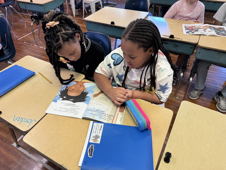 Reading with our Eagle Buddy