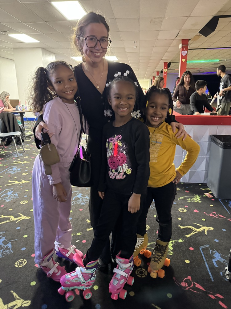 students posing at skate party 