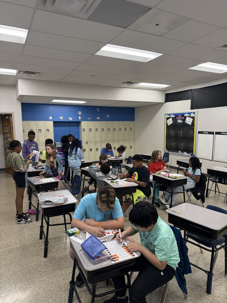 After a long week of testing, 3 Ohl and 6 Sharos were able to come together and make paper wind chimes.