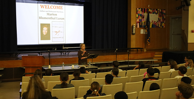 Holocaust survivor Marion Lazan speaks to Shore Road students