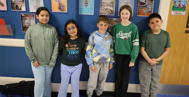 1)	Students at Winthrop Avenue School donned blue and green to mark Earth Day on April 22. 