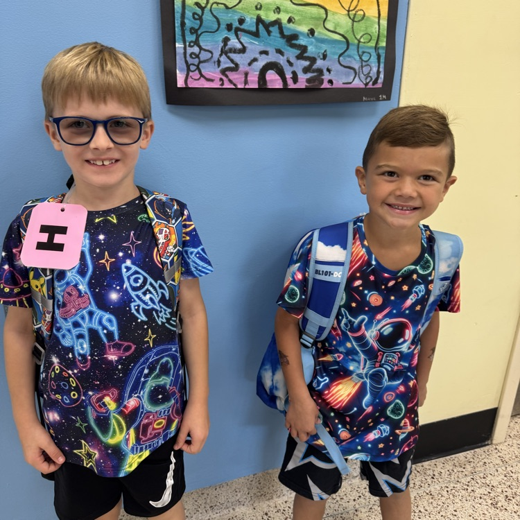 two students standing