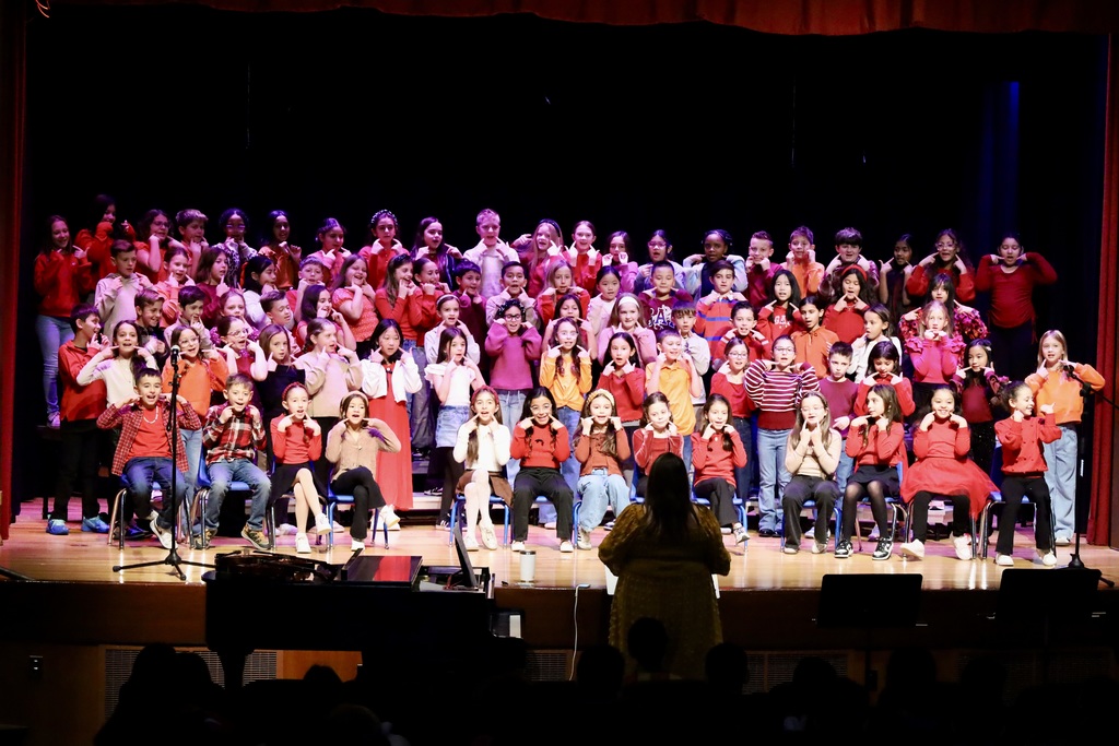 chorus performing on stage