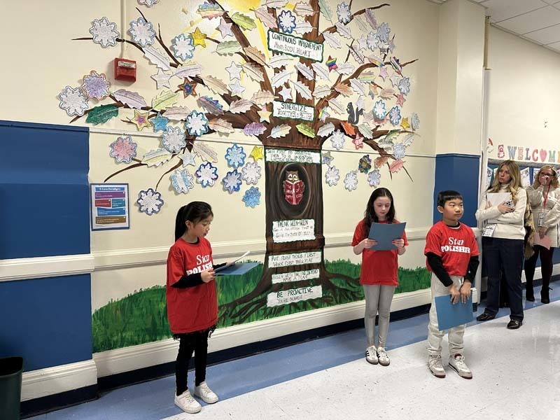 Students dressed in red.