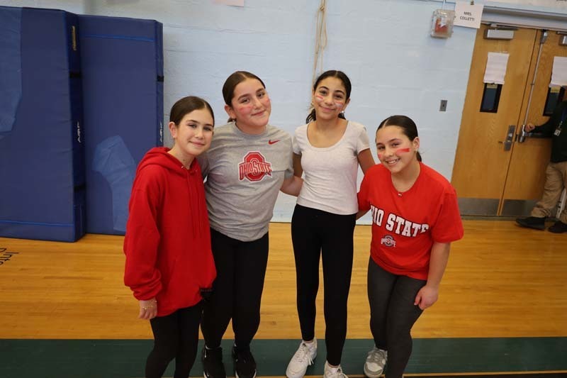 Sporting the colors and logos of different colleges and universities, Shore Road sixth graders faced off for the highly anticipated College Olympics event! Shining Star Leaders were divided into teams that represented different educational institutions and competed in rounds of timed basketball shooting, a fitness relay and volleyball.