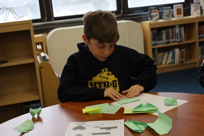 Collaboration is key in Winthrop Avenue School’s Origami Club, as peers carefully make complex folds in papers that result in eye-catching creations.  In celebration of St. Patrick’s Day, club members met with green sheets of paper in hand to form shamrocks. #IgnitetheStarsWithin #StarsLeadandLearn 