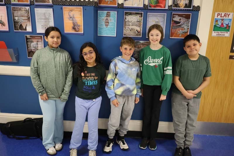 Winning Star Leaders dressed in bright green and blue