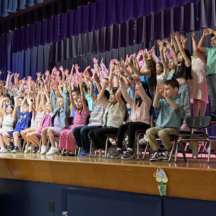 kids with hands over head