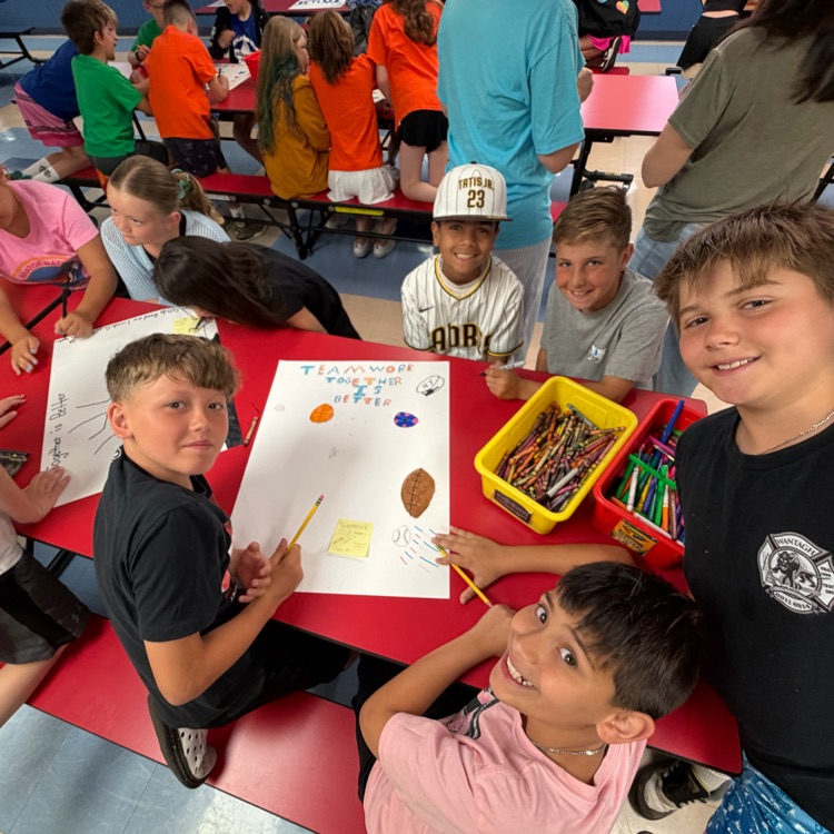 students creating posters