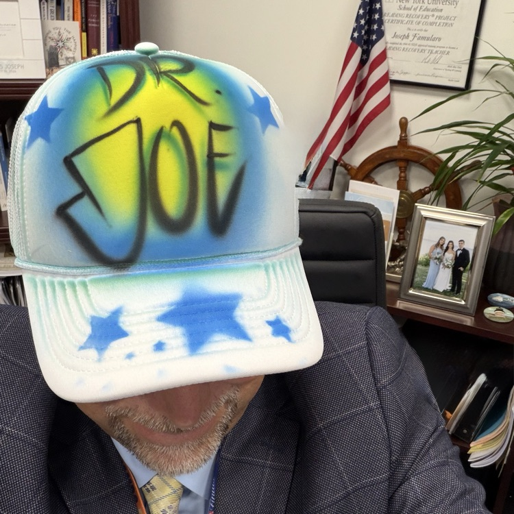 Dr. Famularo wearing a Dr. Joe hat