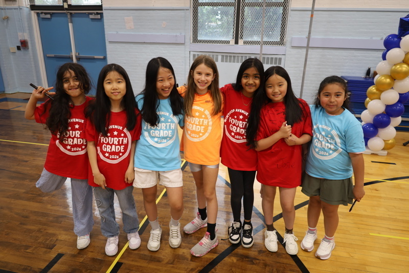 group of children wearing colorful shirts