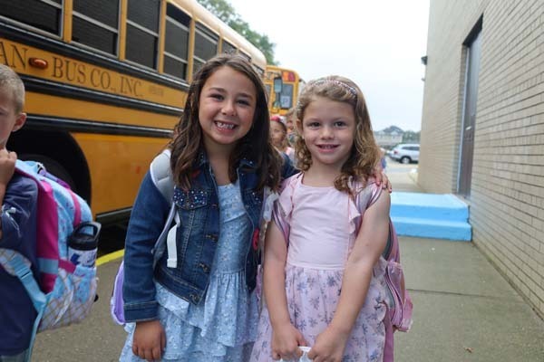 two students Arriving on the first day of school