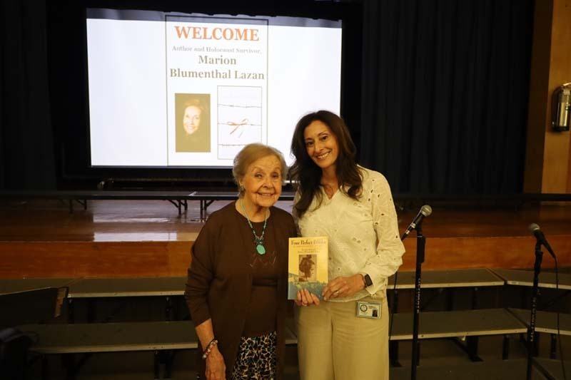 2) Mrs. Lazan shared insight into her book, “Four Perfect Pebbles,” alongside Principal Patrice Matthews.