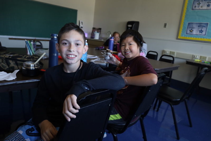 Students and instructors in classroom setting