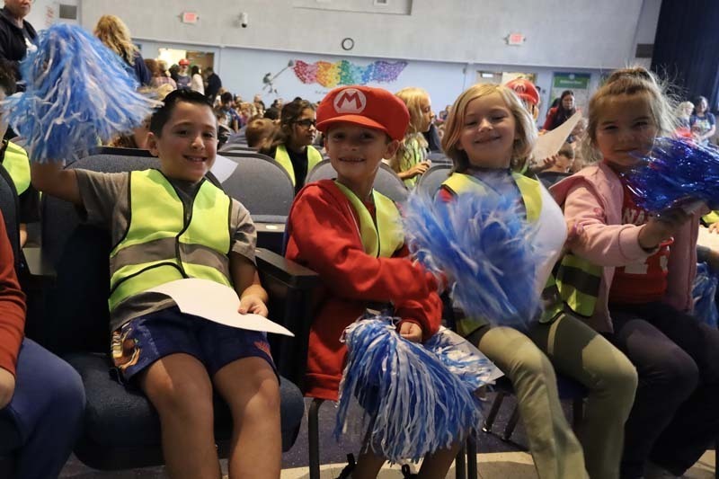 Students dressed as Mario Bros characters.