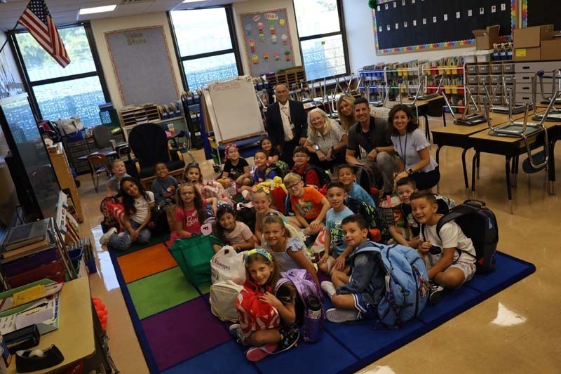 Students smiling during first day.