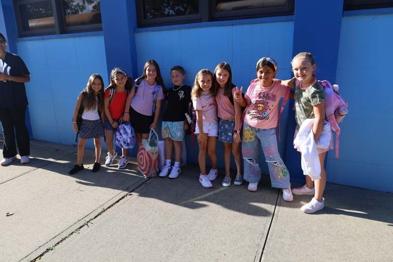 Students smiling during first day.