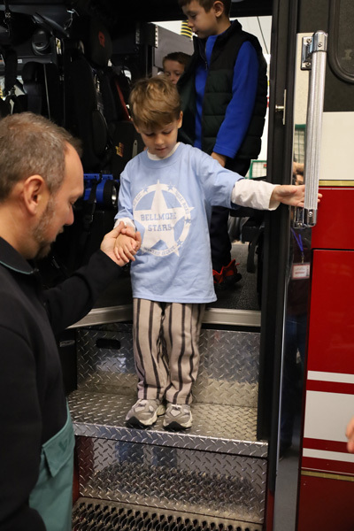 students in firehouse truck