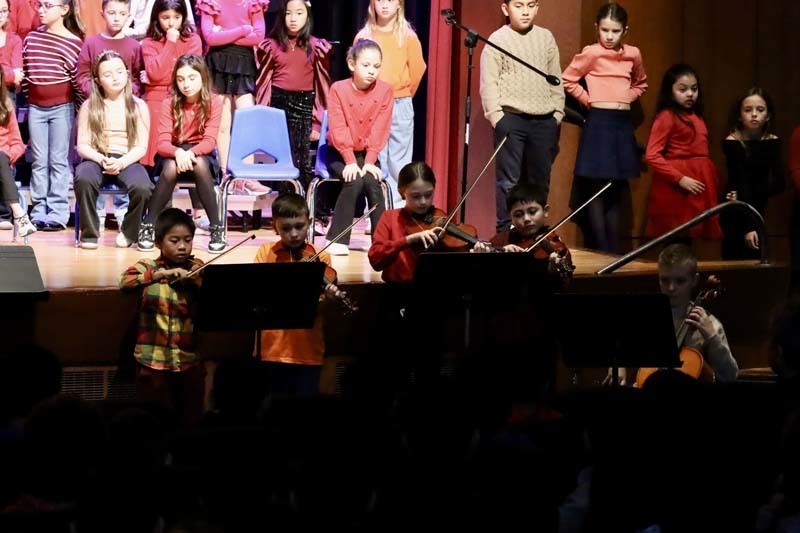 1) Fourth graders spread smiles from the stage at Winthrop Avenue School on Nov. 21 during their chorus concert.