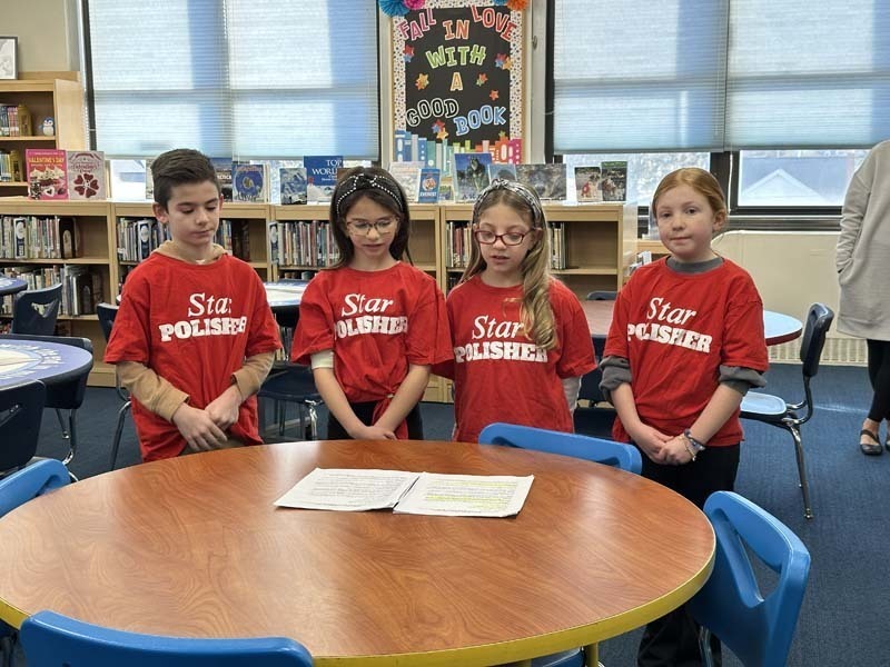 1)	Winning Star Leaders at Winthrop Avenue School led a tour of the building for visiting school district administrators on Jan. 21. 