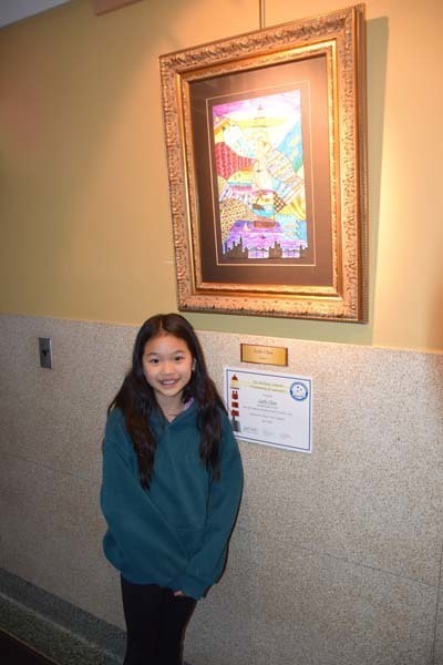 2)	Star Leaders beamed with pride next to their displayed work. 
