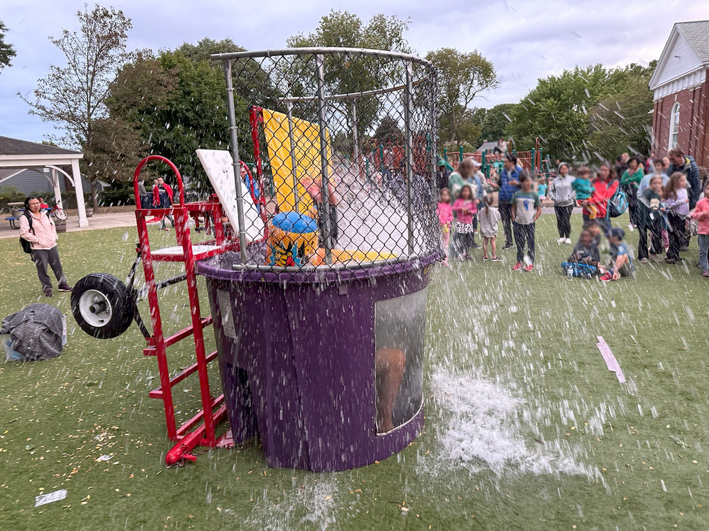 Dunk Tank volunteer takes the plunge!