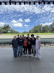 group photo in front of field