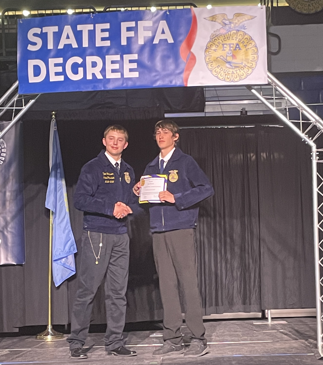Jace getting his state FFA Degree.