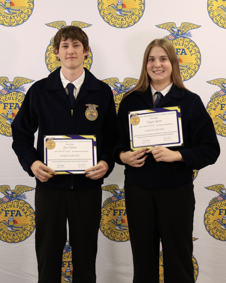 Jace and Kaylee with their certificates.