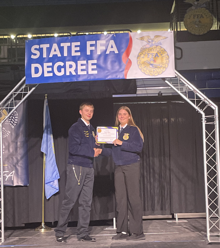 Kaylee getting her state FFA Degreee