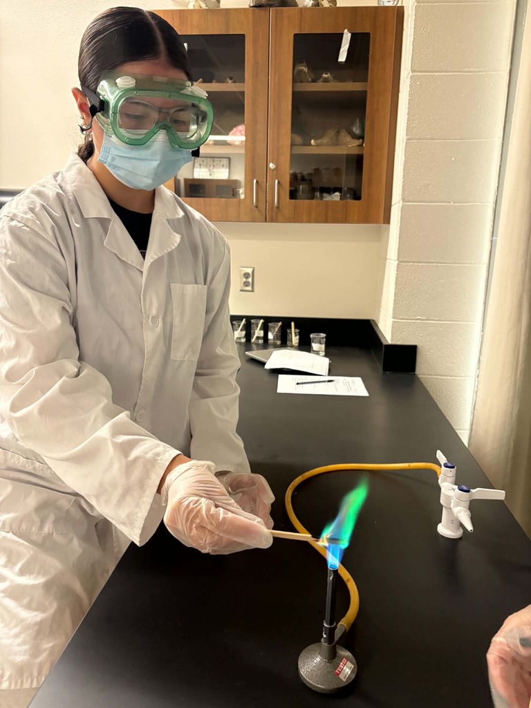student making green flame