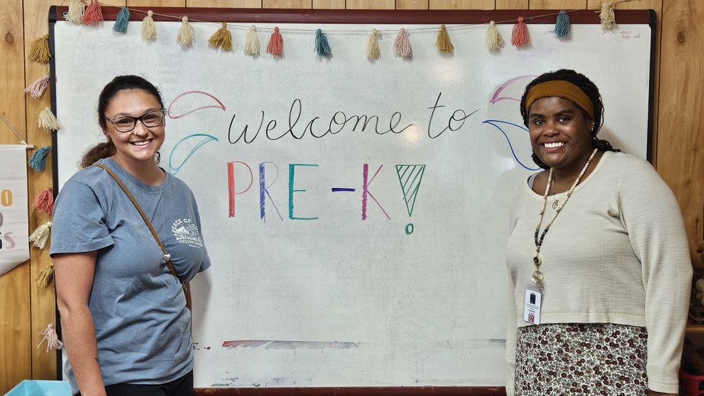 Associate teacher, Ms. Jasmine West, and Lead teacher, Ms. Danielle Coleman stand ready to welcome their "little bulldog" preschoolers at the Open House on August 27.