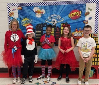 Teacher and students dressed up as their favorite book character