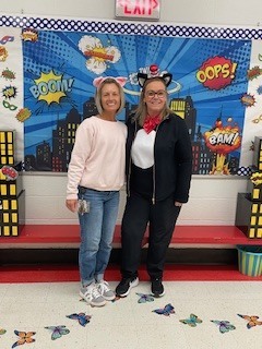 Two teachers dressed up for reading month