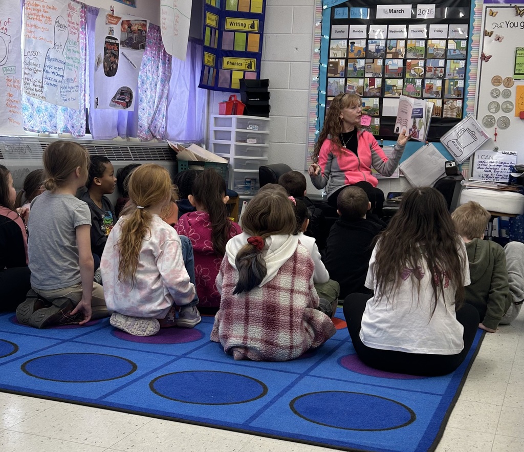 Mrs. Combs reading to 2nd graders