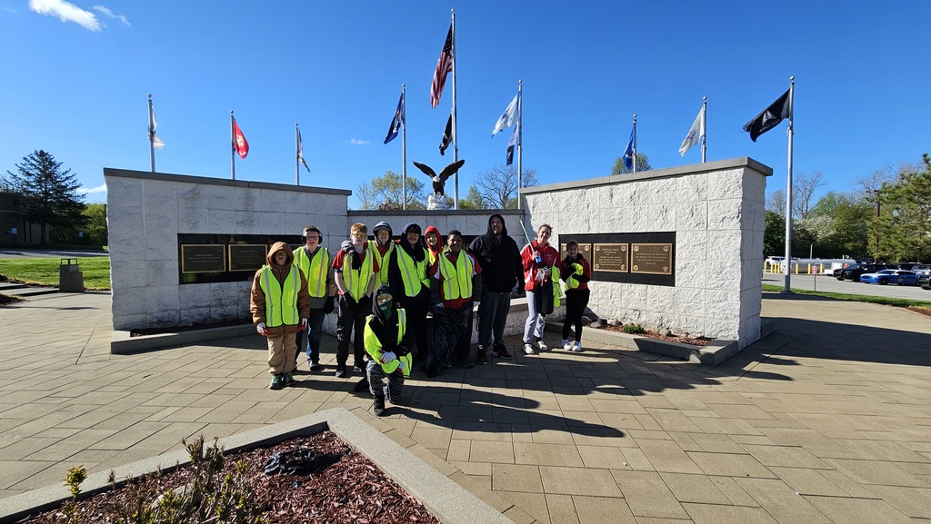 BMS spring clean up crew in front of Veteran's Memorial