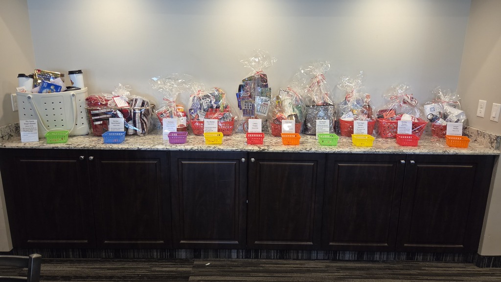 Image from the golf outing -  baskets of prizes to be raffled
